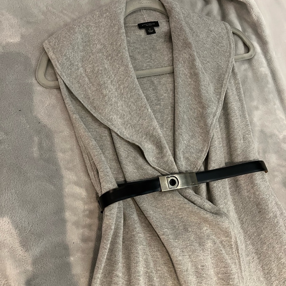 BELT NOT INCLUDED!  Light weight mid thigh length sleeveless sweater/coverup.